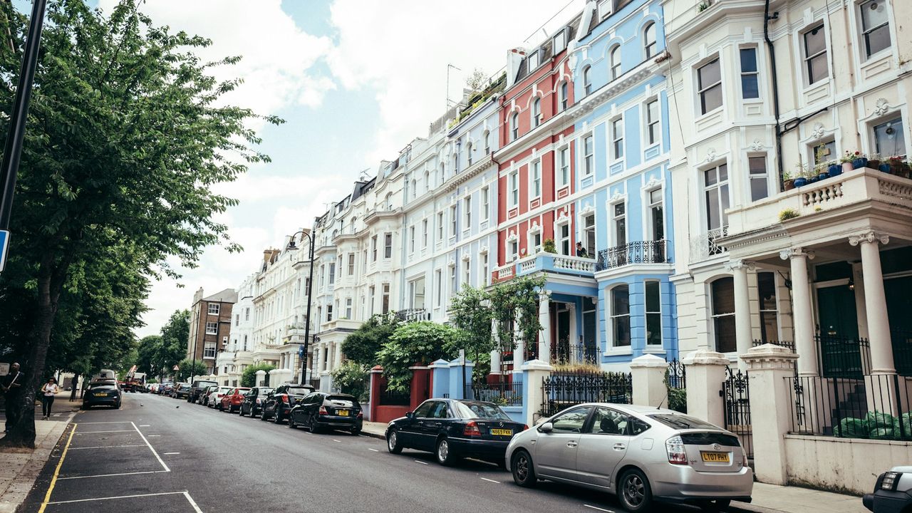 Colourful terraced houses on a Chelsea street in west London