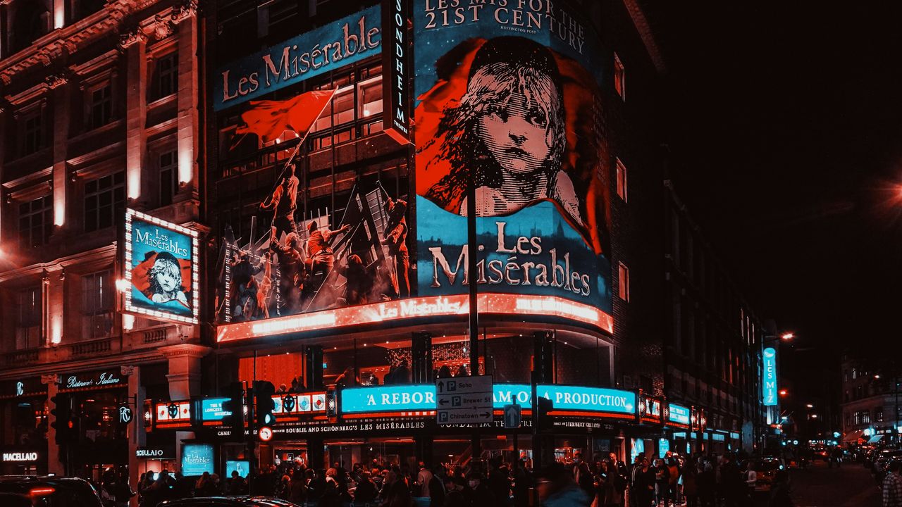 Busy streets and theatre lights in London's West End