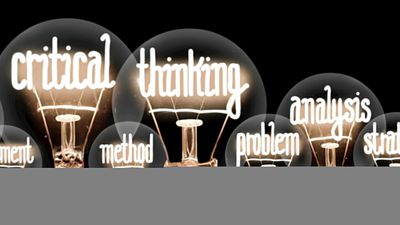 A panoramic banner featuring a row of glowing light bulbs against a black background, with buzzwords related to critical thinking written inside each bulb.